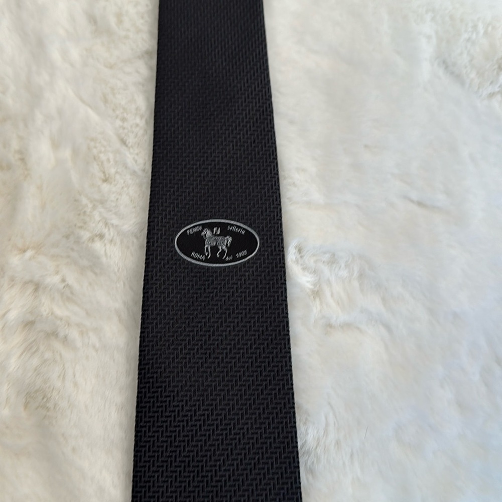 Skinny black fancy tie.